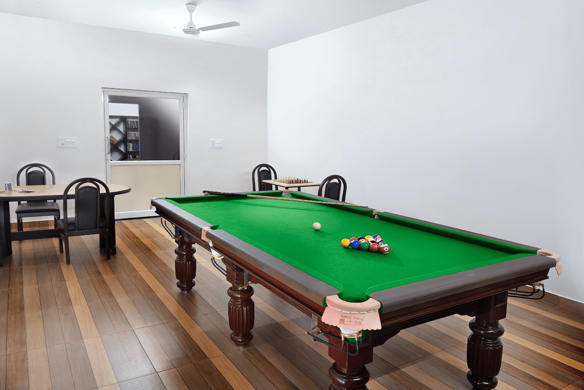  Indoor games with a pool table, cards, chess, etc., 